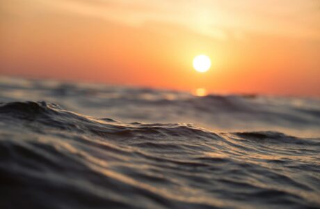 body of water during golden hour